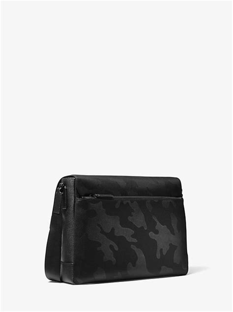 michael kors tech friendly bag|KORX X TECH Camouflage Messenger Bag .